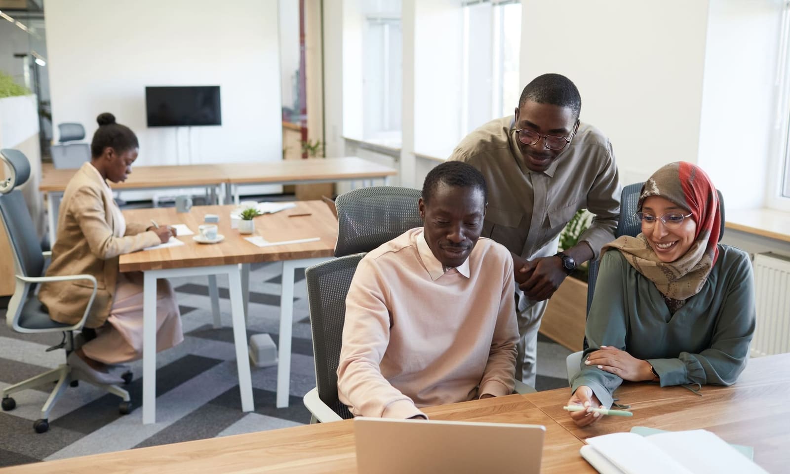 Business professionals collaborating in a modern office